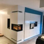 Insert à bois d'angle dans une cuisine à Mont Saint Aignan